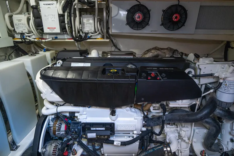 Water Dog Yacht Photos Pics Engine room of 2024 Riviera 5400 Sport Yacht with advanced mechanical systems.
