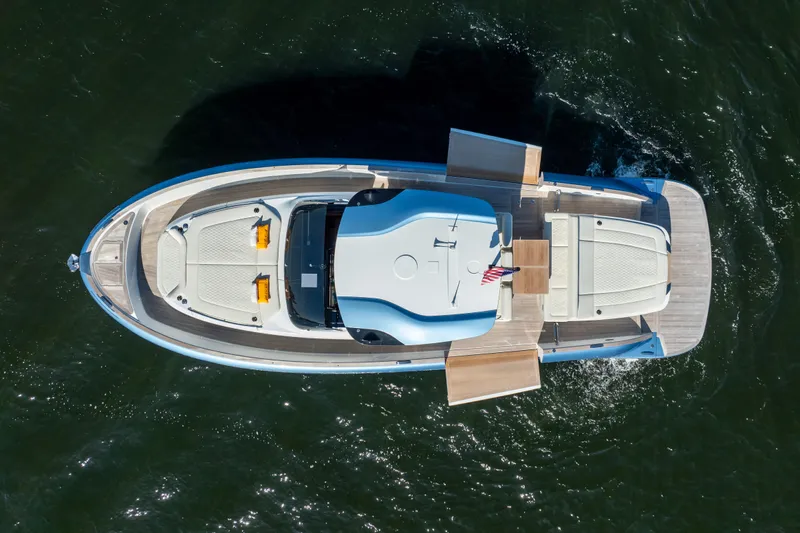  Yacht Photos Pics Aerial view of 2025 Solaris Power 44 Open luxury yacht cruising on water.