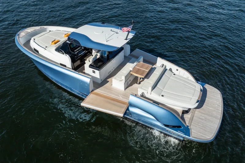  Yacht Photos Pics 2025 Solaris Power 44 Open yacht on water, featuring sleek design and spacious deck.