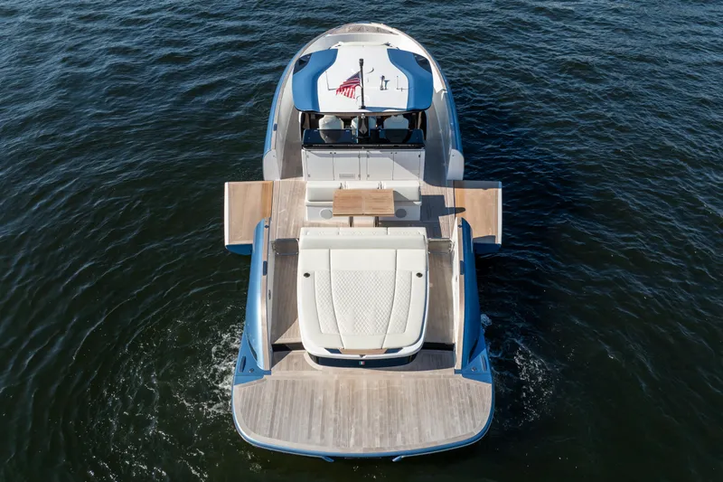  Yacht Photos Pics 2025 Solaris Power 44 Open yacht on water, featuring spacious deck and modern design.