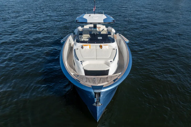  Yacht Photos Pics 2025 Solaris Power 44 Open yacht on calm water, showcasing sleek design and luxury features.