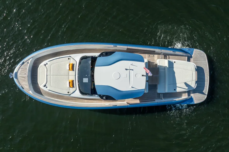  Yacht Photos Pics Aerial view of 2025 Solaris Power 44 Open yacht cruising on water.