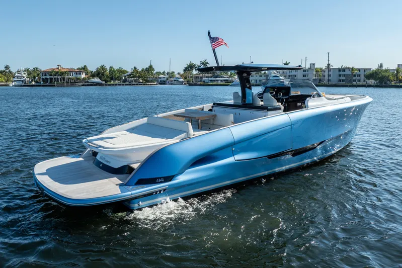  Yacht Photos Pics 2025 Solaris Power 44 Open yacht cruising on a sunny day, showcasing sleek design.