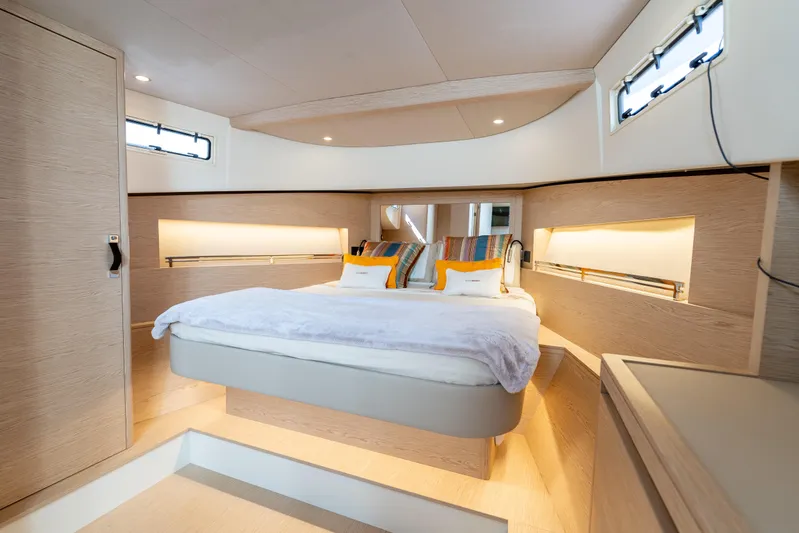  Yacht Photos Pics Luxurious interior of 2025 Solaris Power 44 Open yacht bedroom with modern design.