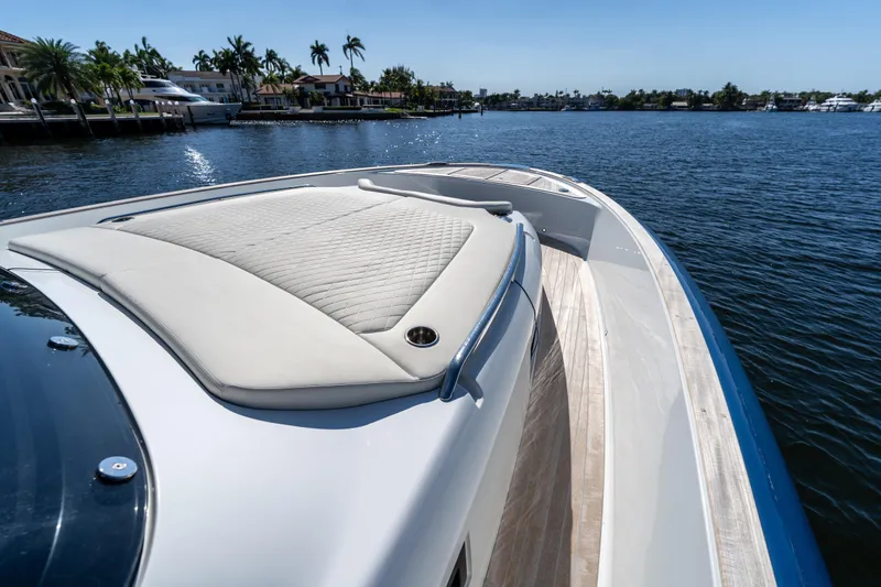  Yacht Photos Pics 2025 Solaris Power 44 Open yacht with luxurious deck and waterfront view.