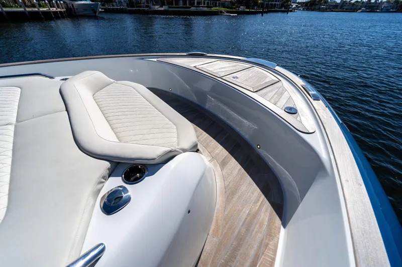  Yacht Photos Pics Luxurious deck of 2025 Solaris Power 44 Open yacht with elegant seating and wood finish.