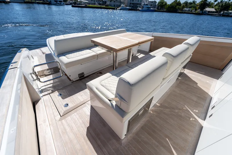  Yacht Photos Pics Luxurious seating area on 2025 Solaris Power 44 Open yacht, featuring elegant design and waterfront views.