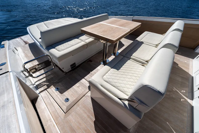  Yacht Photos Pics Luxurious seating area on 2025 Solaris Power 44 Open yacht, featuring elegant design and ocean view.
