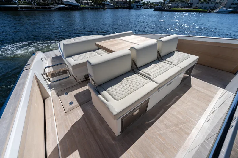  Yacht Photos Pics Luxurious seating area on 2025 Solaris Power 44 Open yacht, featuring elegant design and waterfront view.