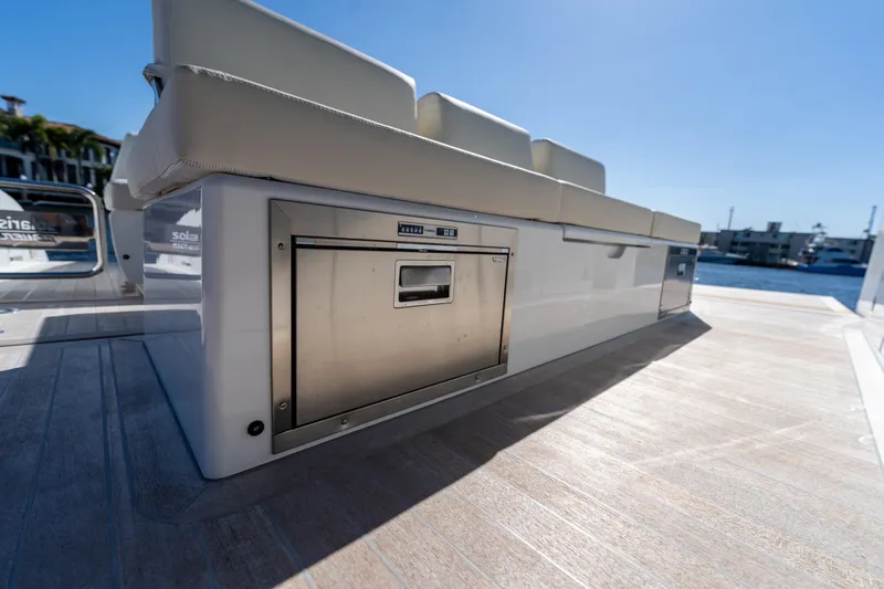  Yacht Photos Pics 2025 Solaris Power 44 Open yacht interior with sleek seating and built-in storage.