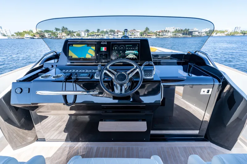  Yacht Photos Pics Helm of 2025 Solaris Power 44 Open yacht with advanced navigation systems.