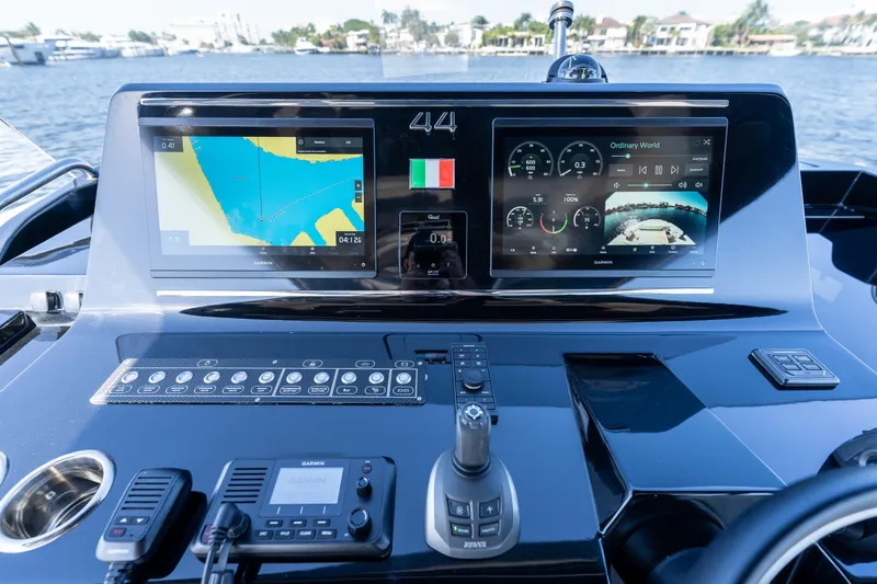  Yacht Photos Pics Control panel of 2025 Solaris Power 44 Open yacht with navigation screens and controls.