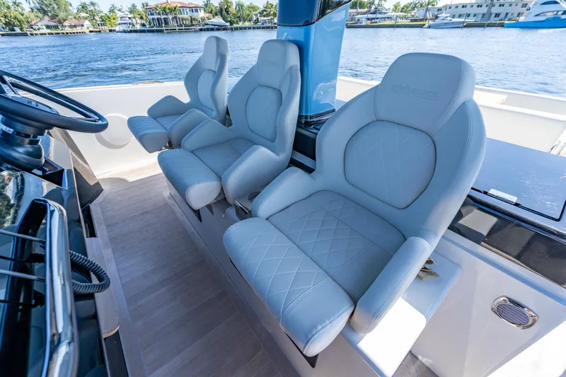  Yacht Photos Pics Luxurious seating on the 2025 Solaris Power 44 Open yacht, featuring elegant design and waterfront views.