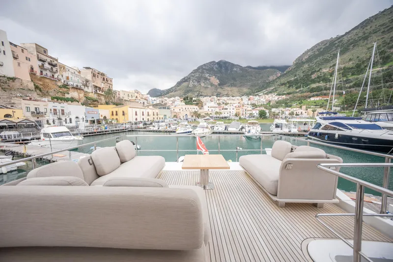 M/y Golden Pearl Yacht Photos Pics Luxurious 2017 Azimut yacht deck with scenic harbor and mountain views.