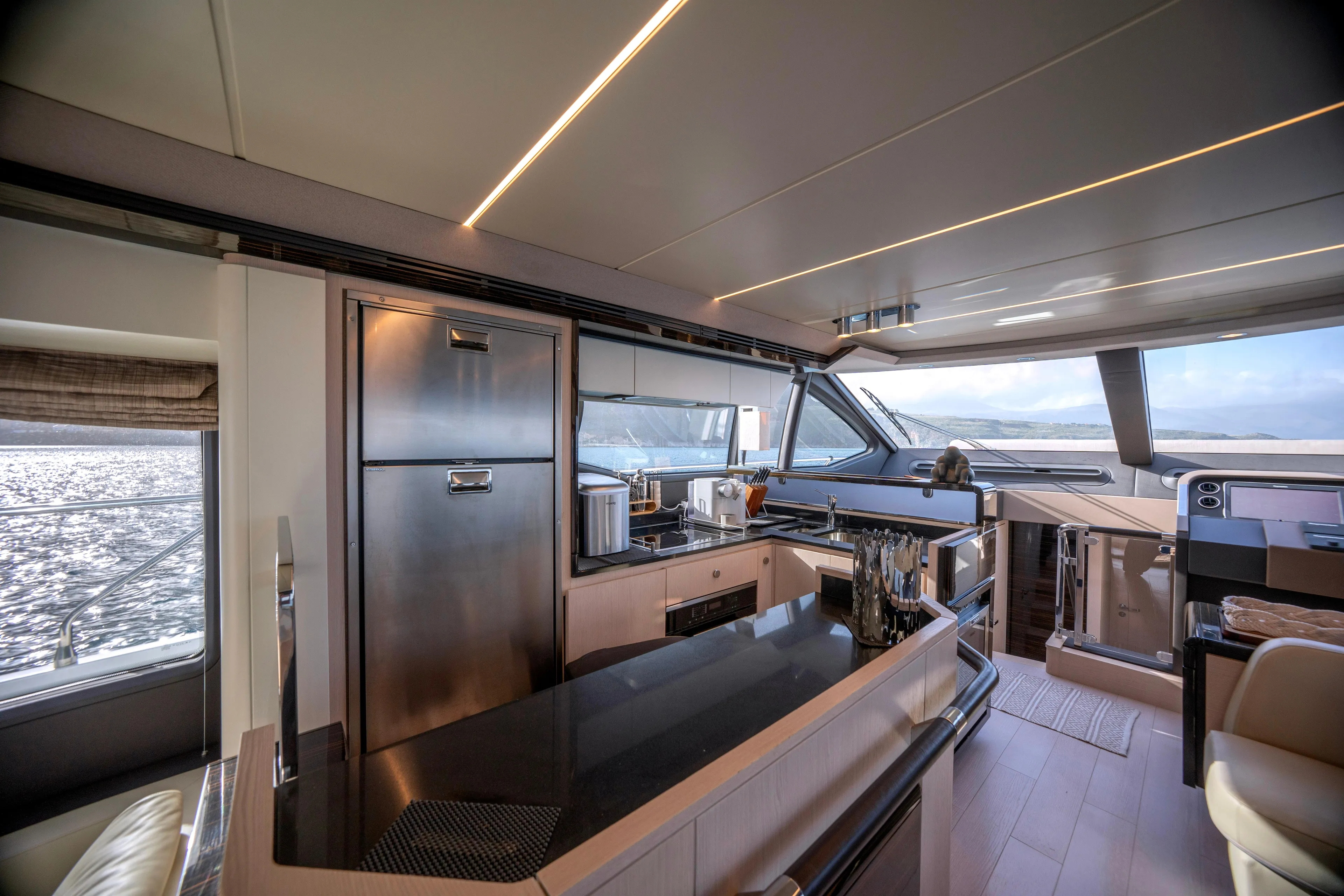 M/y Golden Pearl Yacht Photos Pics Luxurious 2017 Azimut yacht interior with modern kitchen and ocean view.
