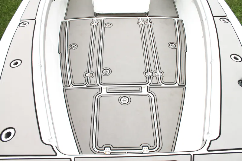  Yacht Photos Pics 2005 Yellowfin 31 Open boat deck with sleek, modern design and storage compartments.