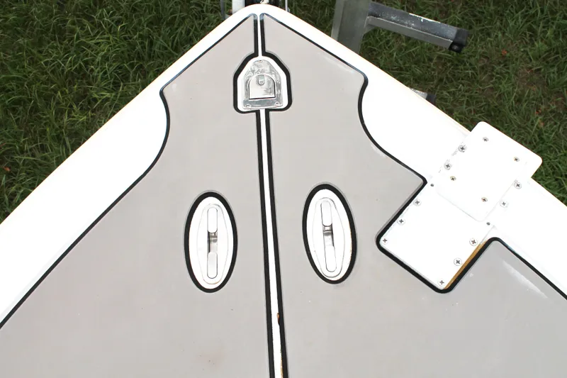  Yacht Photos Pics Bow of 2005 Yellowfin 31 Open boat with hatches and hardware.