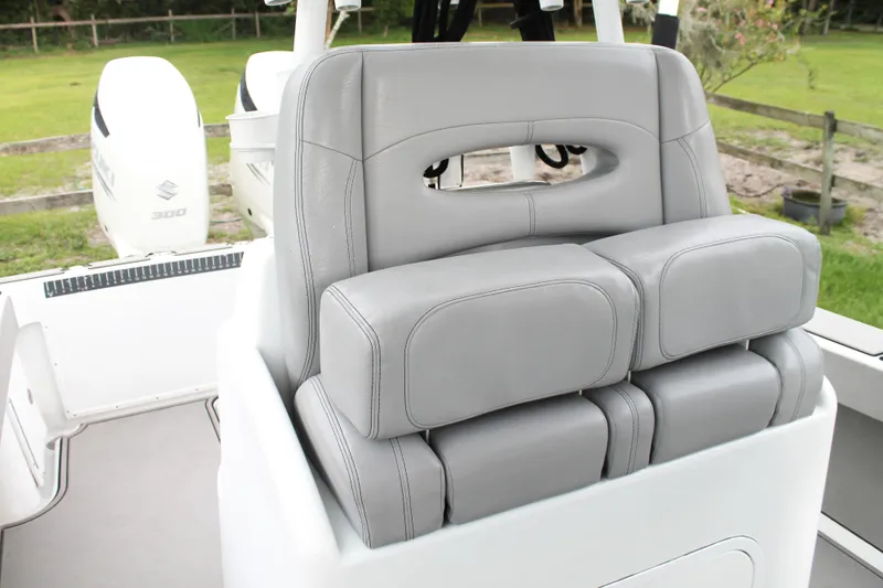  Yacht Photos Pics 2005 Yellowfin 31 Open boat with gray cushioned seating and dual Suzuki 300 engines.