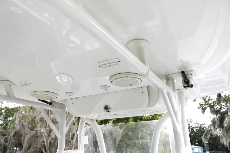  Yacht Photos Pics 2005 Yellowfin 31 Open boat's T-top with speakers and lights.