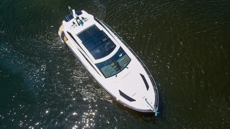  Yacht Photos Pics Aerial view of a 2009 Marquis 500 Sport Coupe yacht on water.