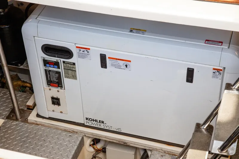  Yacht Photos Pics Kohler power system in 2009 Marquis 500 Sport Coupe yacht engine room.