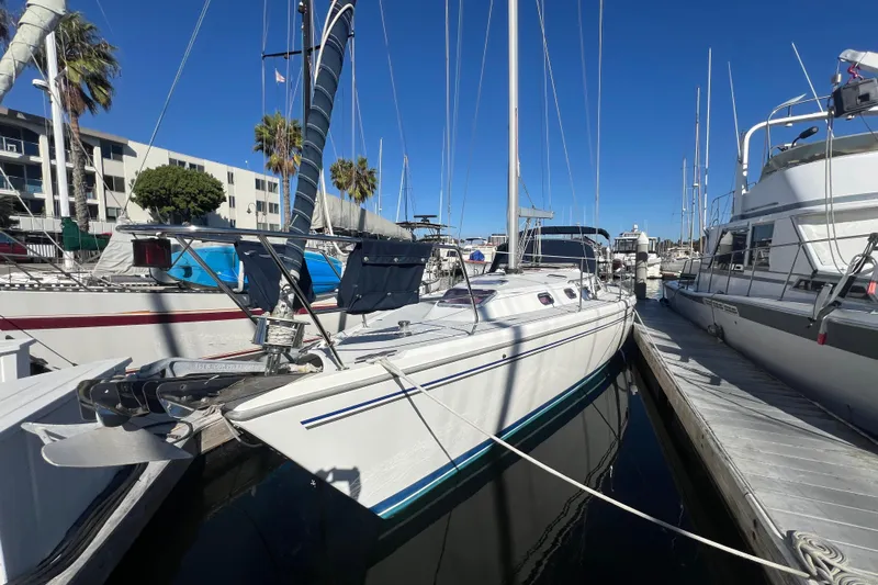  Yacht Photos Pics 2007 Catalina 42 MkII sailboat docked at marina under clear blue sky.
