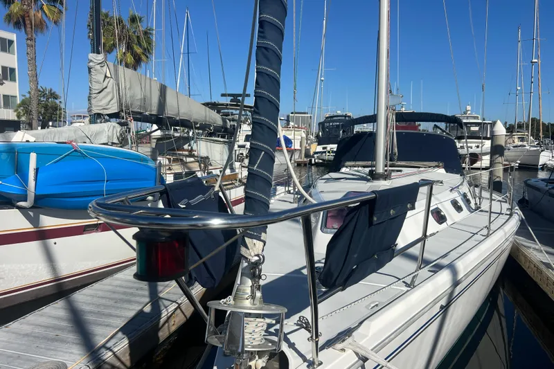  Yacht Photos Pics 2007 Catalina 42 MkII sailboat docked at marina under clear blue sky.