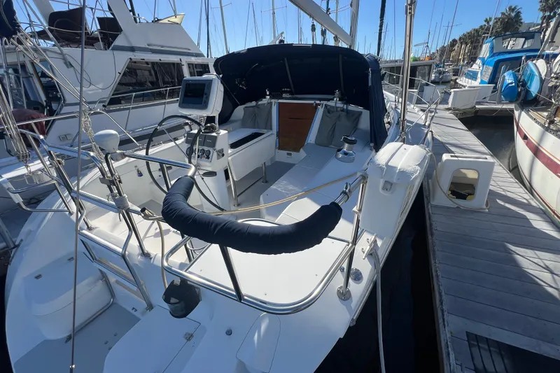  Yacht Photos Pics 2007 Catalina 42 MkII sailboat docked at marina, featuring spacious cockpit and navigation equipment.