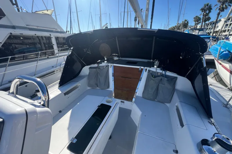  Yacht Photos Pics Cockpit of a 2007 Catalina 42 MkII sailboat, featuring seating and a covered helm.