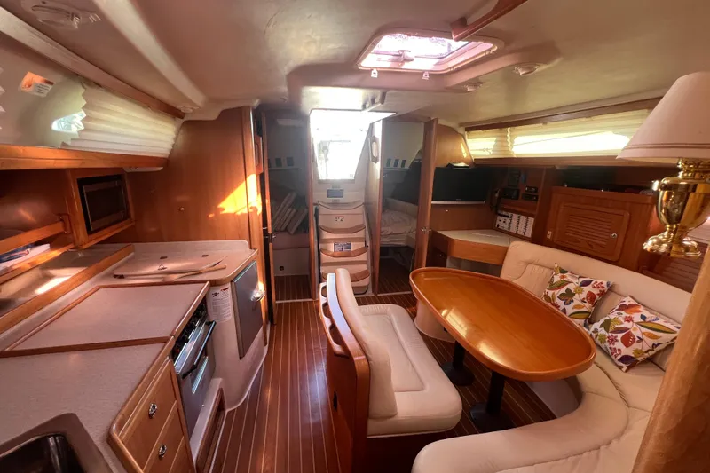  Yacht Photos Pics Luxurious 2007 Catalina 42 MkII yacht interior with cozy seating and modern amenities.