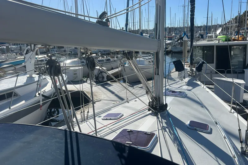  Yacht Photos Pics 2007 Catalina 42 MkII sailboat docked in a marina, surrounded by other boats.