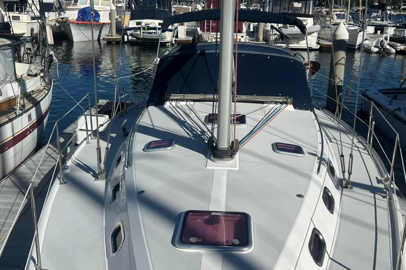  Yacht Photos Pics 2007 Catalina 42 MkII sailboat docked at marina, showcasing deck and mast.