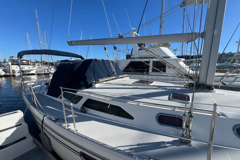  Yacht Photos Pics 2007 Catalina 42 MkII sailboat docked at marina under clear blue sky.