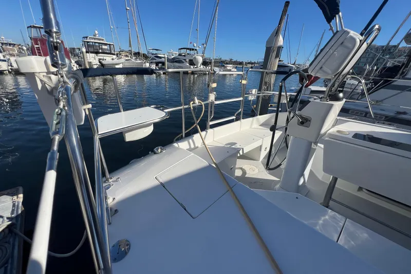  Yacht Photos Pics 2007 Catalina 42 MkII sailboat cockpit in marina, surrounded by other boats.
