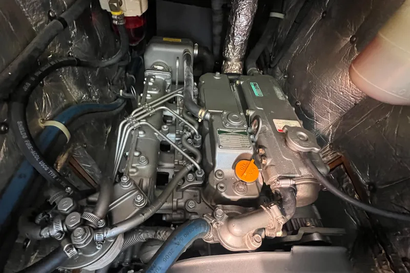  Yacht Photos Pics Engine compartment of a 2007 Catalina 42 MkII sailboat, showcasing detailed mechanical components.