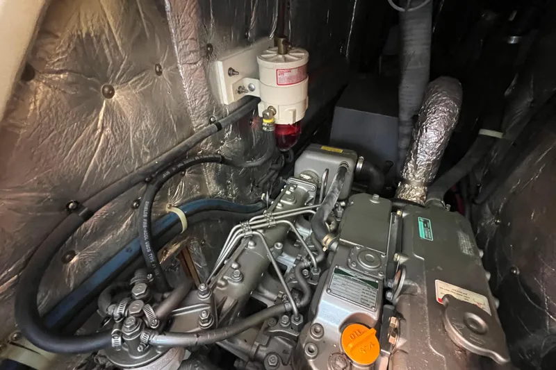  Yacht Photos Pics Engine compartment of a 2007 Catalina 42 MkII sailboat, showcasing detailed mechanical components.