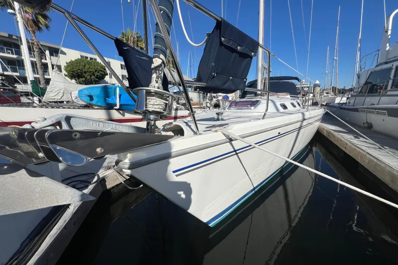  Yacht Photos Pics 2007 Catalina 42 MkII sailboat docked in marina, clear blue sky background.