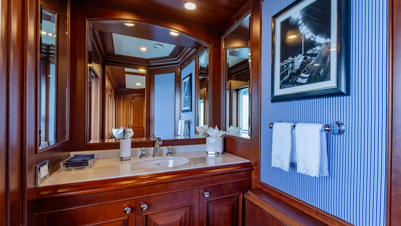 Focus Yacht Photos Pics Luxurious bathroom on 2002 North American Tri-Deck Motor Yacht with elegant wood finishes.