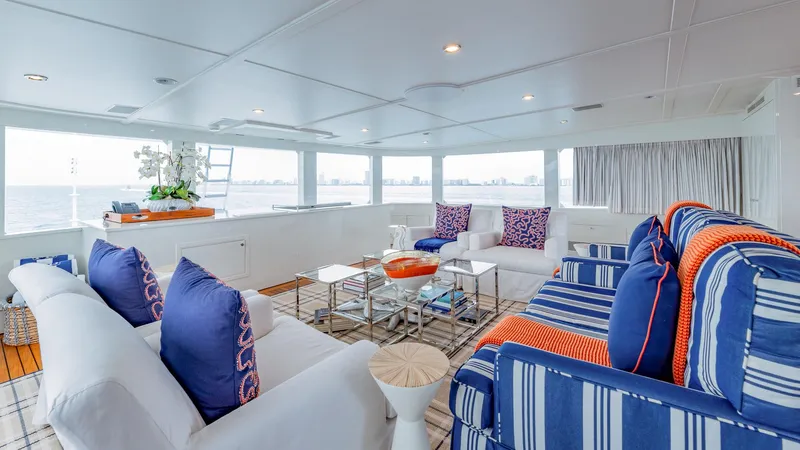 Focus Yacht Photos Pics Luxurious interior of 2002 North American Tri-Deck Motor Yacht with elegant seating and ocean view.