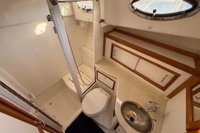 Someday Soon Yacht Photos Pics Luxurious bathroom in 2015 Back Cove 37 yacht with shower, sink, and toilet.