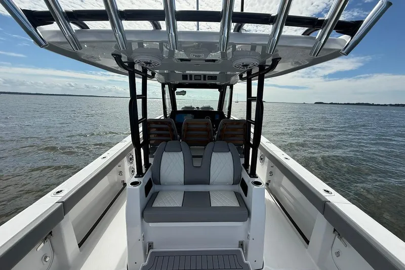  Yacht Photos Pics 2026 Everglades 375 Center Console boat interior with seating, on open water.