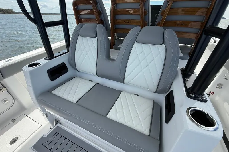 Yacht Photos Pics Luxury seating on 2026 Everglades 375 Center Console boat, featuring diamond-stitched upholstery.