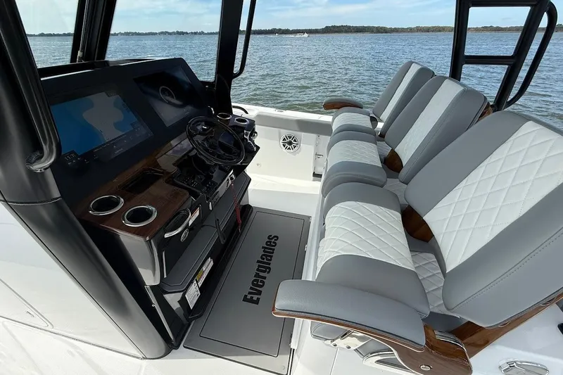  Yacht Photos Pics 2026 Everglades 375 Center Console boat interior with modern helm and seating.