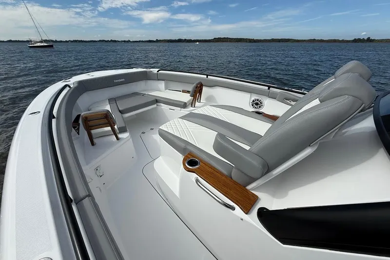  Yacht Photos Pics 2026 Everglades 375 Center Console boat interior with luxurious seating on calm water.