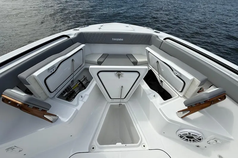  Yacht Photos Pics 2026 Everglades 375 Center Console boat interior with open storage compartments on the water.