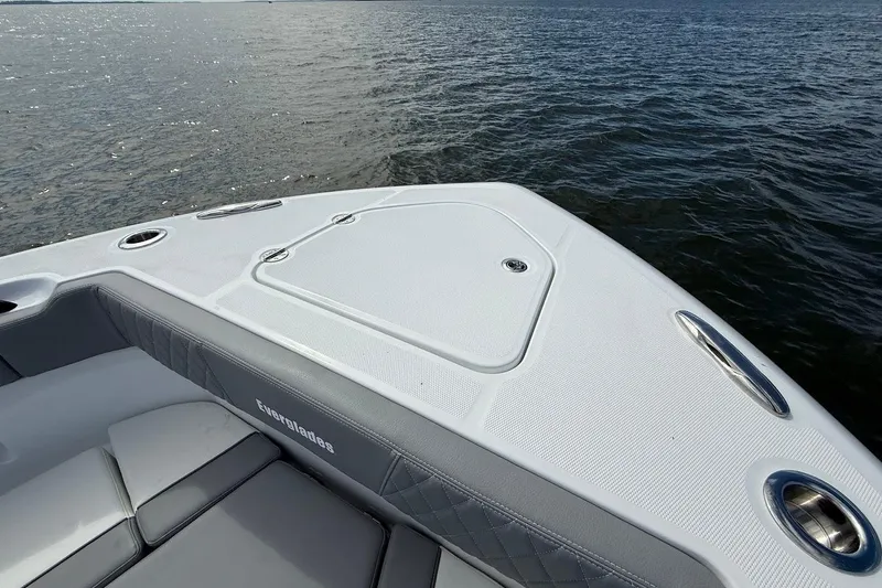  Yacht Photos Pics 2026 Everglades 375 Center Console boat on water, featuring sleek design and comfortable seating.