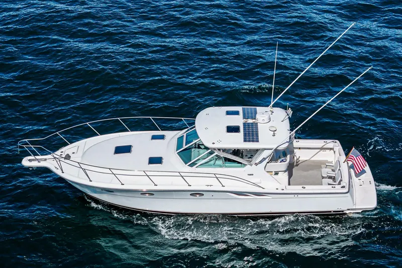 Wave Length Yacht Photos Pics 2001 Tiara Yachts 3500 Open cruising on blue ocean waters.