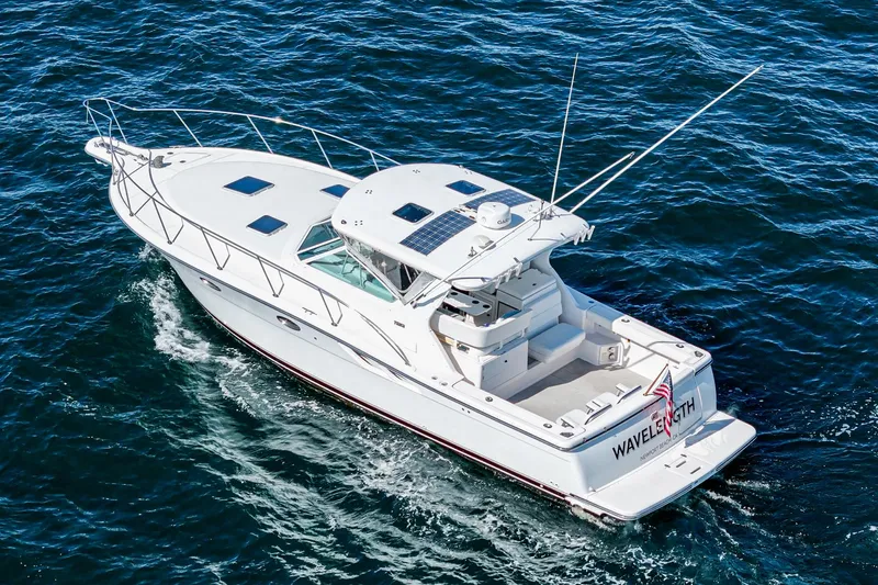 Wave Length Yacht Photos Pics 2001 Tiara Yachts 3500 Open cruising on the ocean, aerial view.