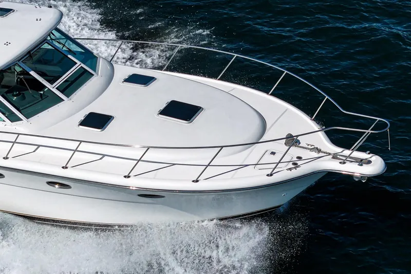 Wave Length Yacht Photos Pics 2001 Tiara Yachts 3500 Open cruising on water, showcasing sleek design and performance.