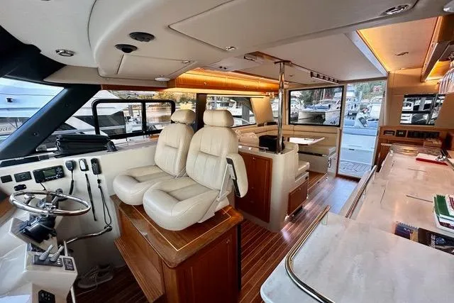 Topcat Yacht Photos Pics Luxurious interior of 2022 Aspen C120 yacht with plush seating and modern amenities.